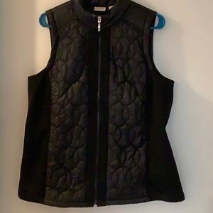 Chicos weekends vest.  Shell 100% nylon ling and fill 100% polyester